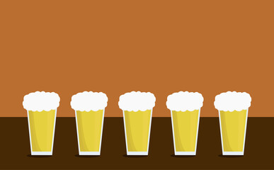 beer glasses on wooden table with brown background