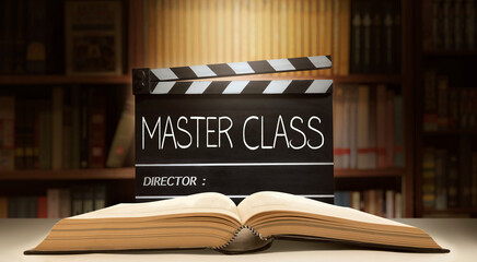 Master Class.Text title on film slate, or Movie clapper board in the library room.