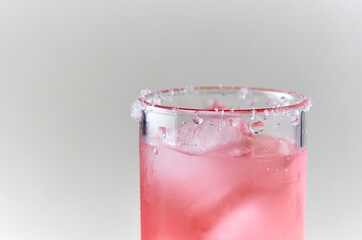 A glass of pink punch