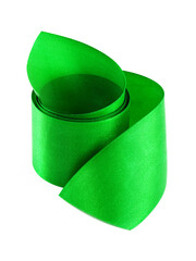 Decorative rolled green satin ribbon isolated on white