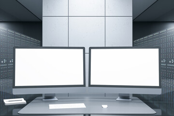 Close up of desktop with empty white computer monitors in futuristic server room office interior. Big data and storage concept. Mock up, 3D Rendering.