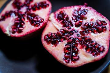 pomegranate cut open with a unique pattern of seeds