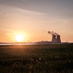 Sunset over the nuclear reactor of Doel in the Port of Antwerp, Belgium.