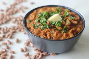 Red kidney beans in a thick and spicy gravy of onions and tomatoes. Commonly known as rajma masala in the northern parts of India