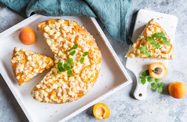Homemade apricot pie topped with streusel