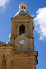 DINGLI, MALTA - 02 JAN, 2020: Detail of old, historic and authentic Christian chapel St. Mary's Parish Church in Dingli with blue sky in the background on a sunny winter day