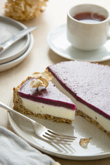 Cheesecake with berries and green mint. Gluten and sugar free vegan, healthy cake.