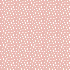 Vintage Polka Dot seamless pattern. White irregular spots, scattered various shape specks on pink background. Abstract vector texture for nursery print design, fashion textile, fabric, scrapbooking