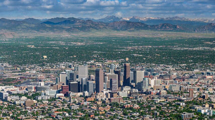 Fototapeta premium Aerial view of Denver Colorado with Rocky mountain backdrop