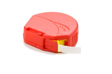 Red double sided tape dispenser on white background
