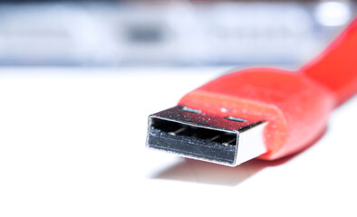 Close up shot of red USB cable