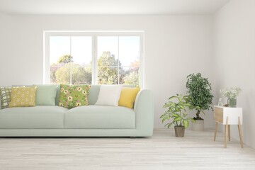 Stylish room in white color with sofa and autumn landscape in window. Scandinavian interior design. 3D illustration