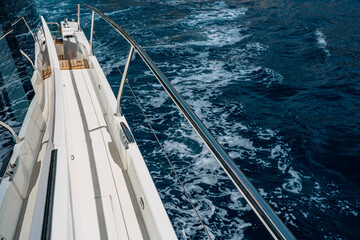 Luxury motor yacht in the azure Mediterranean sea at full speed.Expensive yacht. High quality photo