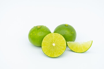Fresh green lemon isolated on white background.