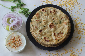A high protein Indian flat bread with whole wheat and lentils. Popularly known as moong dal paratha in many parts of India.
