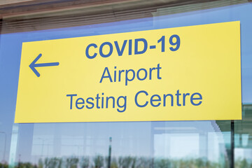 covid-19 airport testing center sign