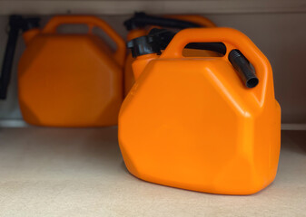 Orange plastic canister on store counters