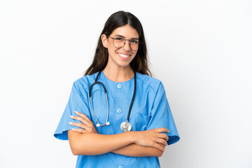 Young surgeon doctor caucasian woman isolated on white background keeping the arms crossed in frontal position