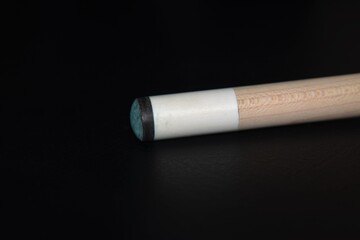 Poll cue tip with blue chalk on end