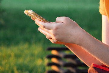 girls hands holding a phone