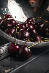 juicy ripe cherry close-up. Red cherry. macro photo. Still life on a dark background.