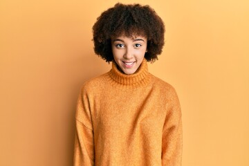 Fototapeta na wymiar Young hispanic girl wearing wool winter sweater with a happy and cool smile on face. lucky person.
