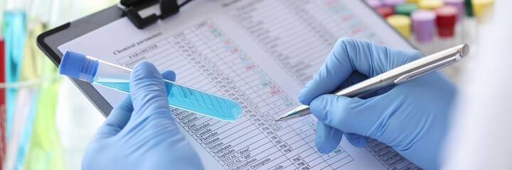 Researcher records chemical parameters in research results