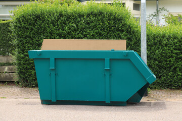 Loaded garbage dumpster