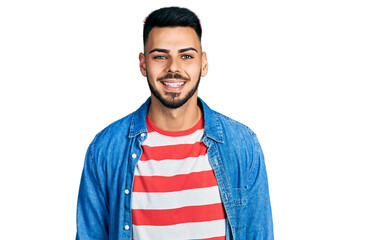 Young hispanic man with beard wearing casual denim jacket with a happy and cool smile on face. lucky person.