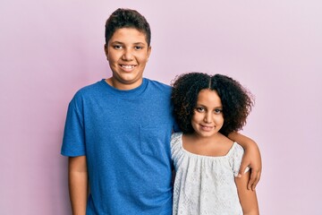 Obraz premium Young hispanic family of brother and sister wearing casual clothes together with a happy and cool smile on face. lucky person.