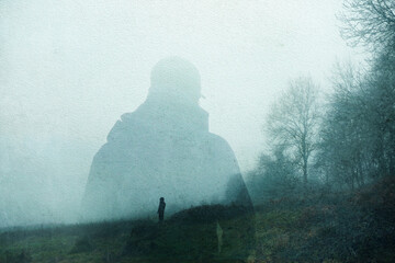 A double exposure of an atmospheric half transparent man looking at a person standing on the edge...
