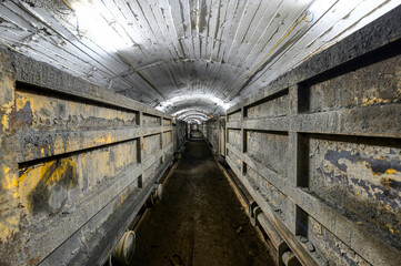 Underground mine. Underground railway for transporting ore. Mine trolley as part of an underground...