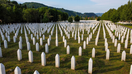 Aerial drone view of gravestones in Memorial centre Potocari, Srebrenica. Victims graveyard. Graves