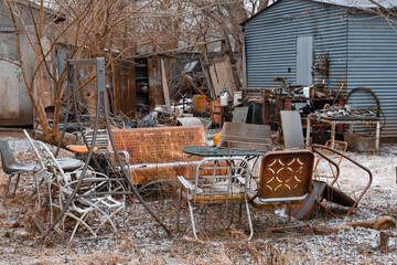 Yard cluttered with junk and trash © Kevin