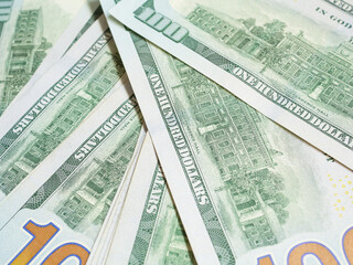 Close up, back side number 100 of American one hundred dollar bill background. Close up, selective focus..