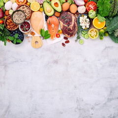 Fototapeta na wymiar Ketogenic low carbs diet concept. Ingredients for healthy foods selection set up on white concrete background.
