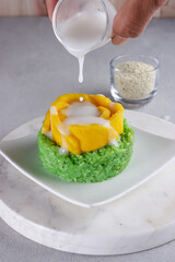 Mango sticky rice pandan or mango with pandan sticky rice , Thai dessert.