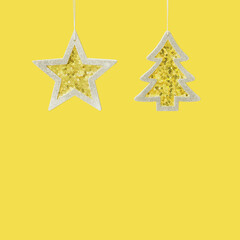 Merry Christmas and Happy New Year background with copy space and trendy colors 2021. Bright yellow Christmas tree and star