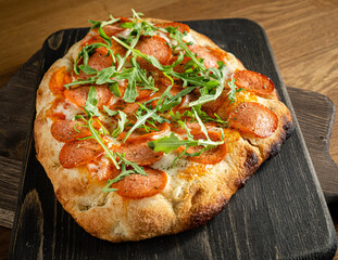 italian pizza on the wooden table