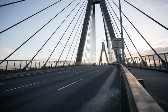 Anzac bridge road empty sunset cables support pylons suspension dark drive transport freeway - Powered by Adobe