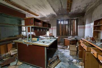 abandoned laboratory room with shelving