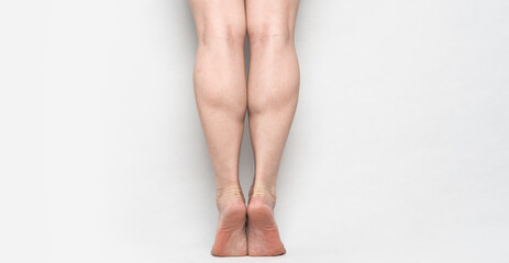 tiptoed people showing his strong gastrocnemius