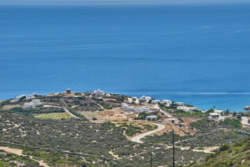 Iconic aerial view From the entrance of the cave of Antiparos island towards the aegean sea in Cyclades, Greece