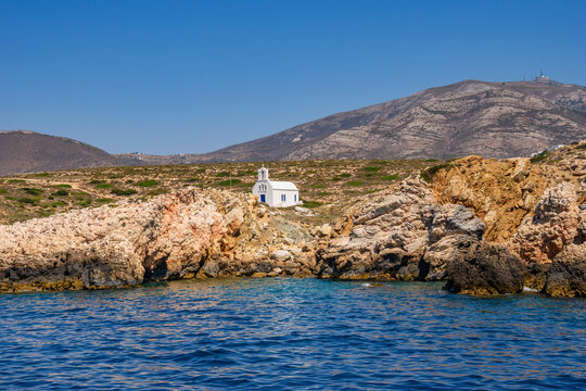 Scenic view of a typical Greek orthodox chapel located next to the sea in Paros island, Cyclades, Greece