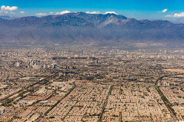 Aaerial view of Santiago skyline and Andes Mountains, Chile.