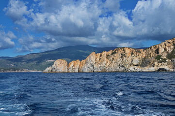 Scenic view of rocks on Elba island while sailing on a boat