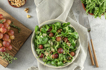 Roasted grapes, pecorino, walnut, and arugula salad.