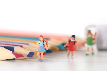 Miniature student doll models and pencils and other stationery