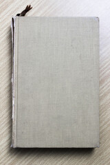 old book on wooden background