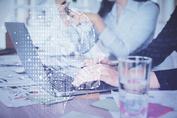 Multi exposure of woman hands working on computer and brain hologram drawing. Ai concept.